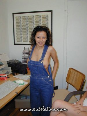 18 year old female Doris G slips off her underwear to pose naked on her bed